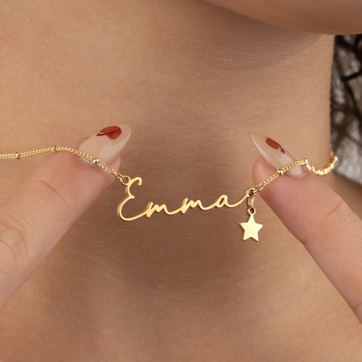 Gold Emma name necklace with star charm