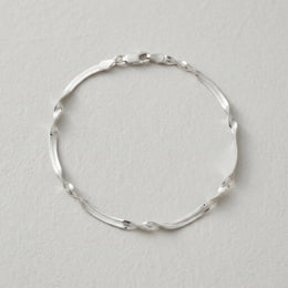 Grooved Herringbone Twist Bracelet in Gold or Silver