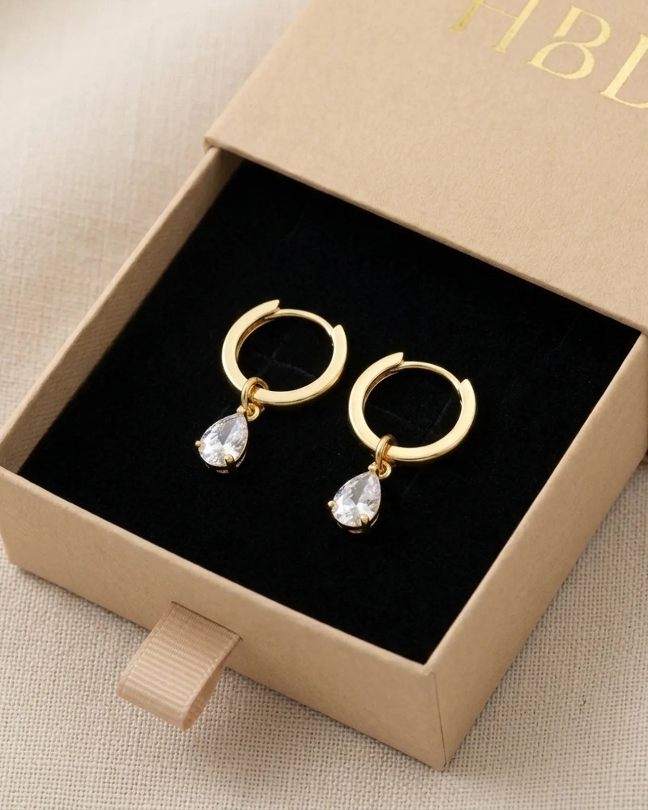 Hinged Hoop with White Cubic Zirconia Teardrop Earrings in Gold & Silver