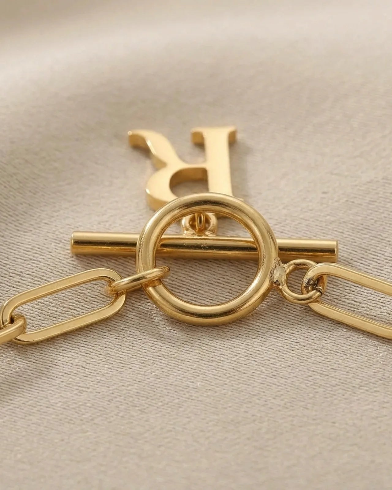 Initial Bracelet with Oval Belcher T-bar Chain & Multiple Charms in Gold or Silver