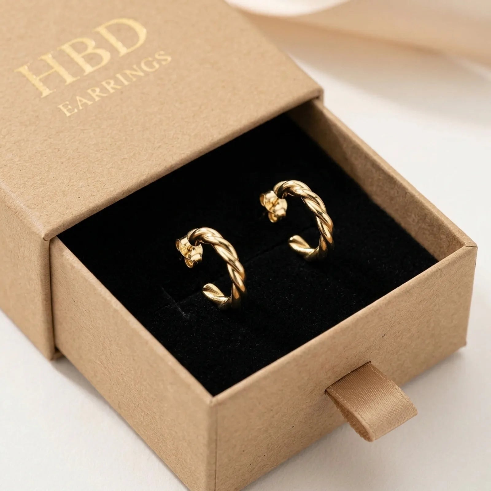 Twisted Hoop Stud Earrings – Sculptural Modern Hoops for Everyday Wear