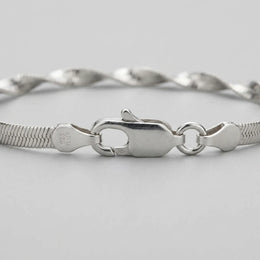Grooved Herringbone Twist Bracelet in Gold or Silver