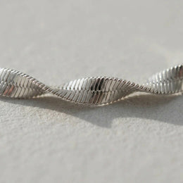 Grooved Herringbone Twist Bracelet in Gold or Silver