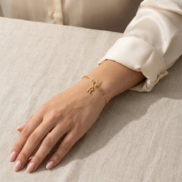 Initial Bracelet with Oval Belcher T-bar Chain & Multiple Charms in Gold or Silver