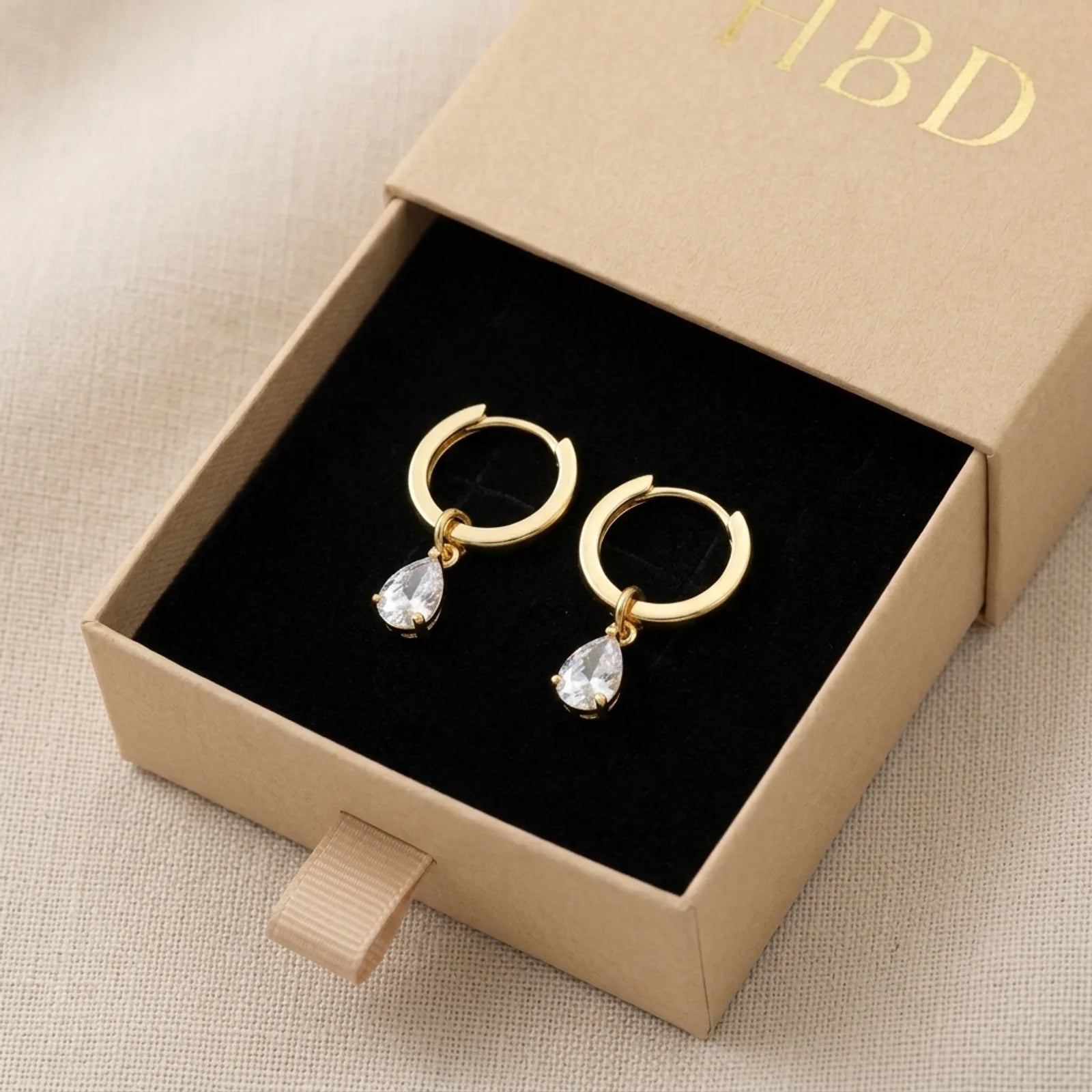 Hinged Hoop with White Cubic Zirconia Teardrop Earrings in Gold & Silver