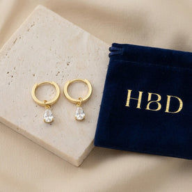 Hinged Hoop with White Cubic Zirconia Teardrop Earrings in Gold & Silver