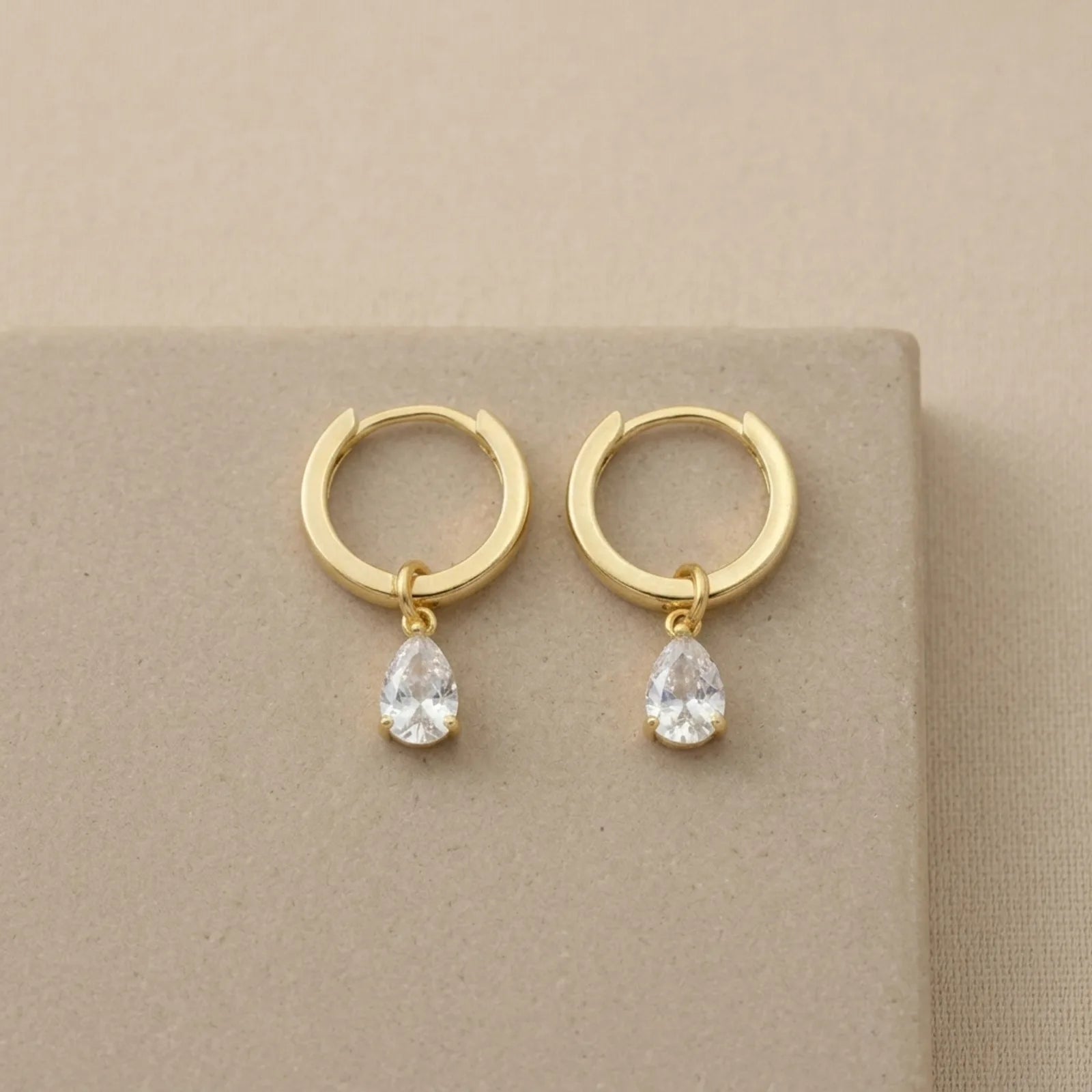 Hinged Hoop with White Cubic Zirconia Teardrop Earrings in Gold & Silver