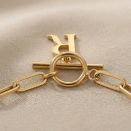 Initial Bracelet with Oval Belcher T-bar Chain & Multiple Charms in Gold or Silver