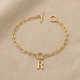 Initial Bracelet with Oval Belcher T-bar Chain & Multiple Charms in Gold or Silver