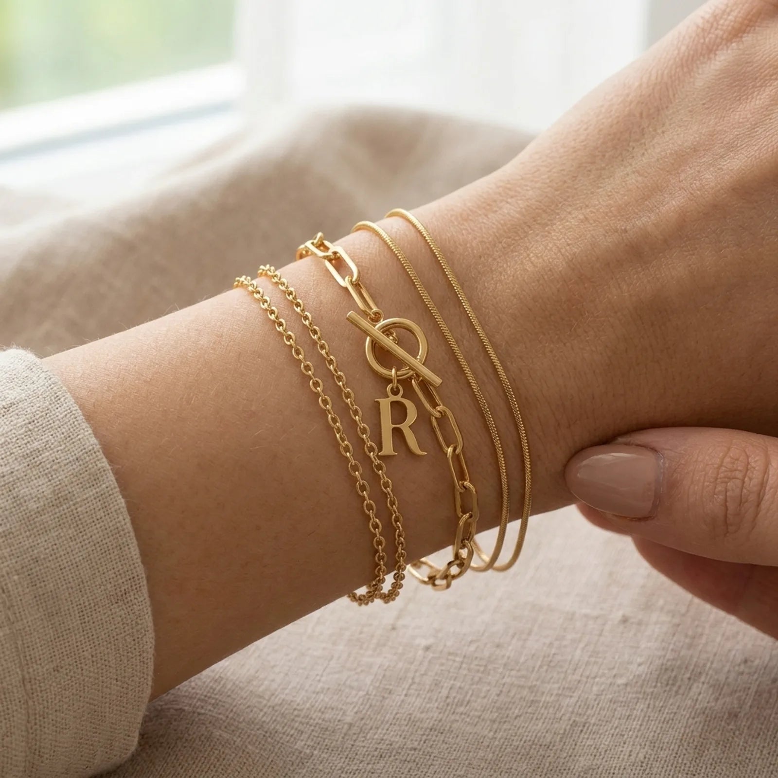 Initial Bracelet with Oval Belcher T-bar Chain & Multiple Charms in Gold or Silver