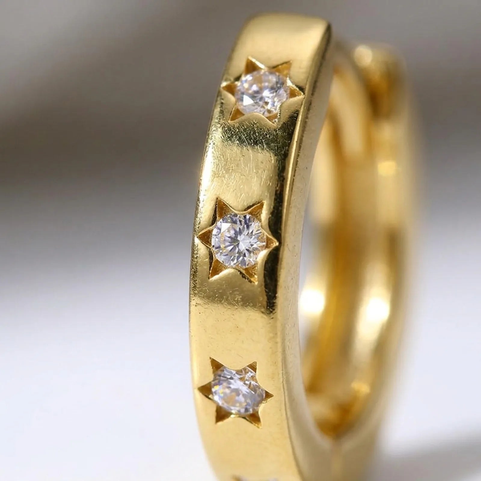Mini Cubic Zirconia Star Huggie Earrings in 14ct Gold or Sterling Silver