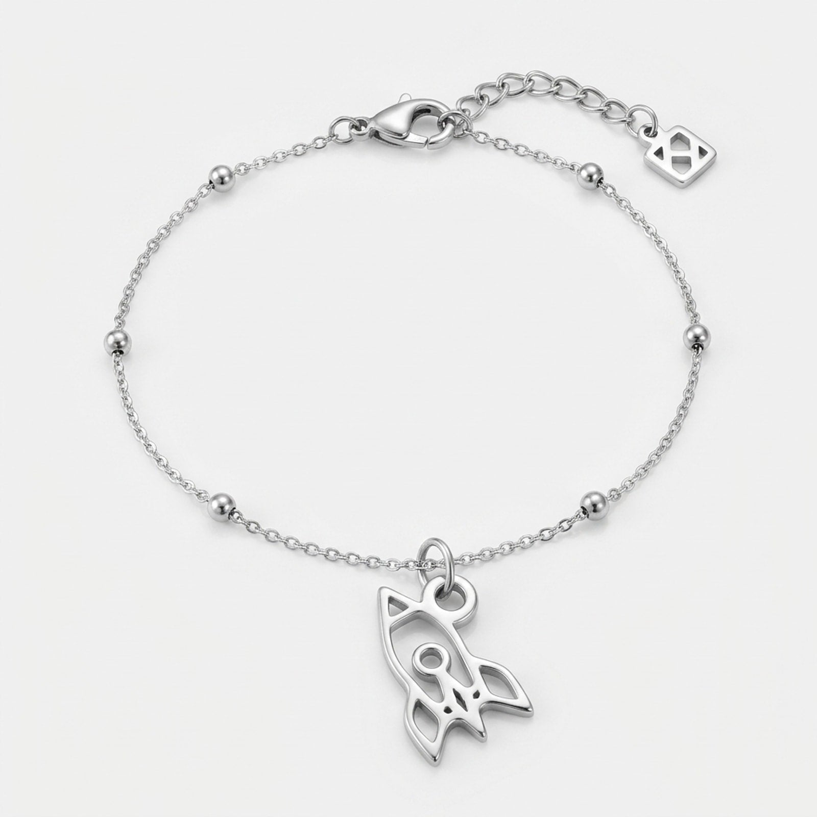 A single silver space rocket charm bracelet on a satellite chain
