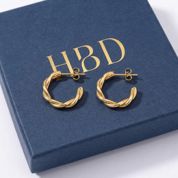Twisted Hoop Stud Earrings – Sculptural Modern Hoops for Everyday Wear