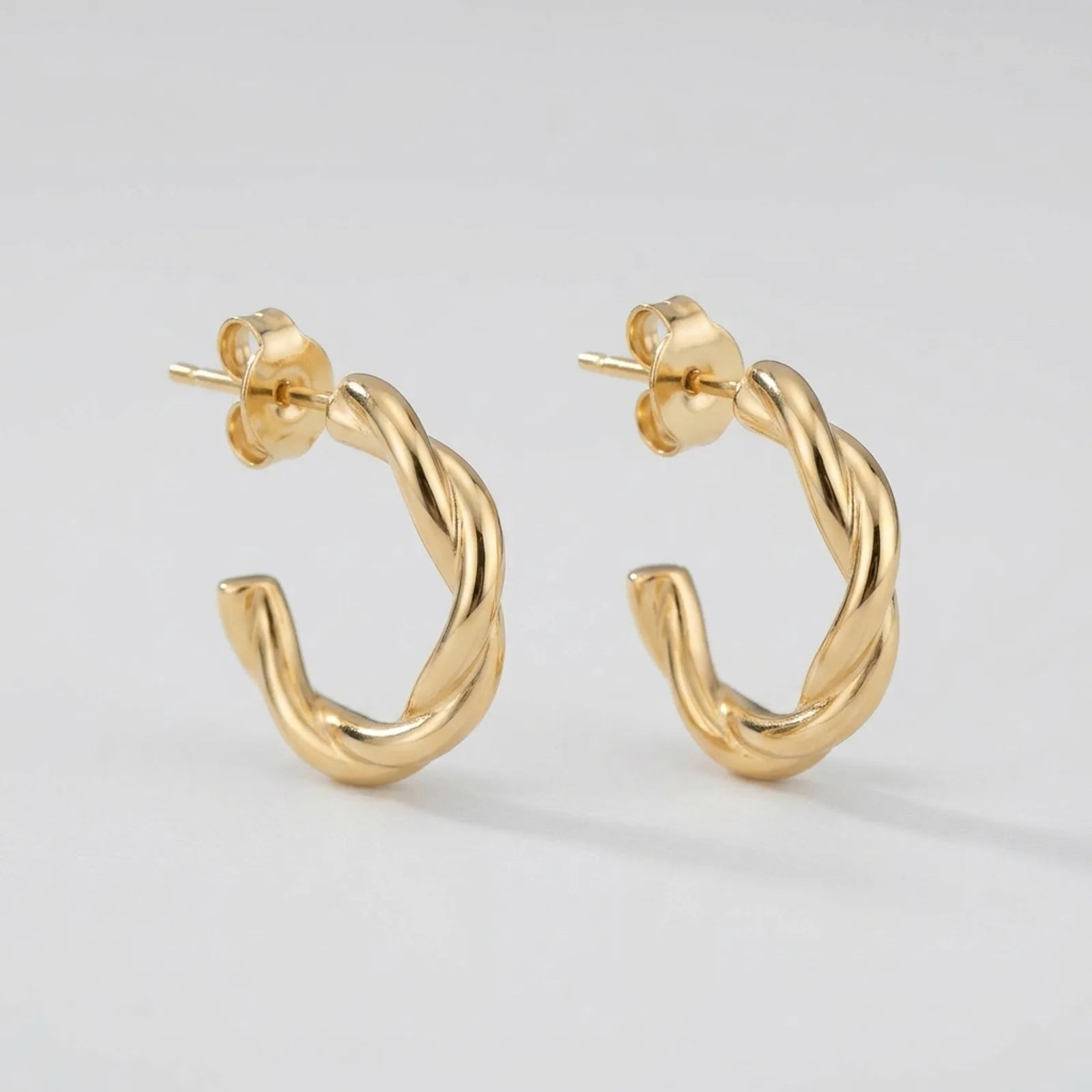 Twisted Hoop Stud Earrings – Sculptural Modern Hoops for Everyday Wear