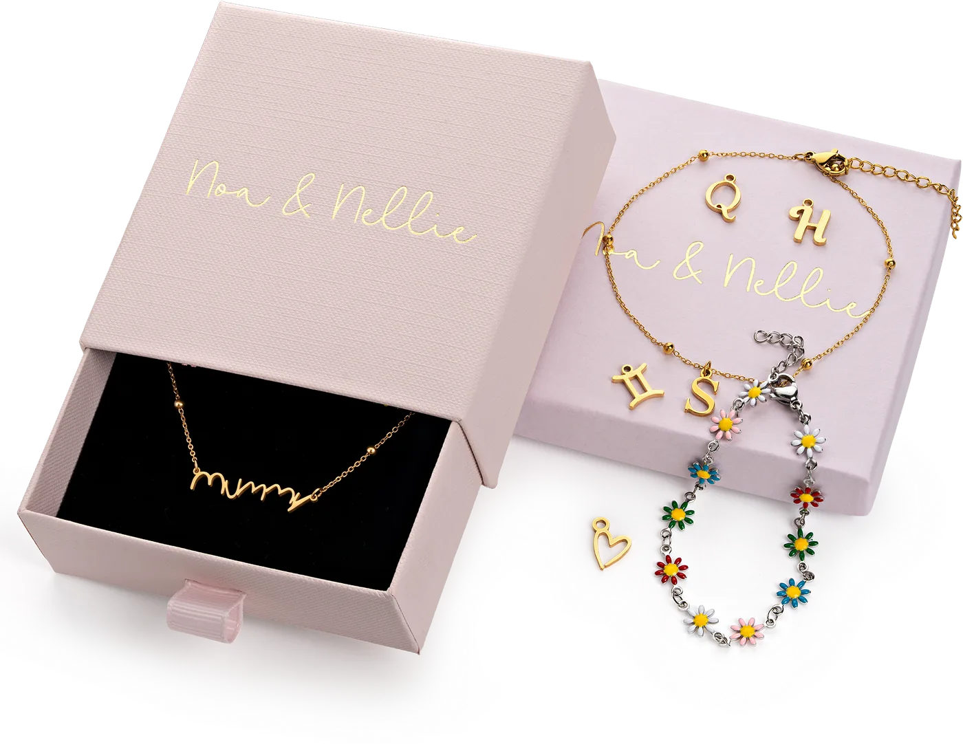 The finished mummy handwriting necklace lying in the black velvet drawer of a pink Noa & Nellie gift box